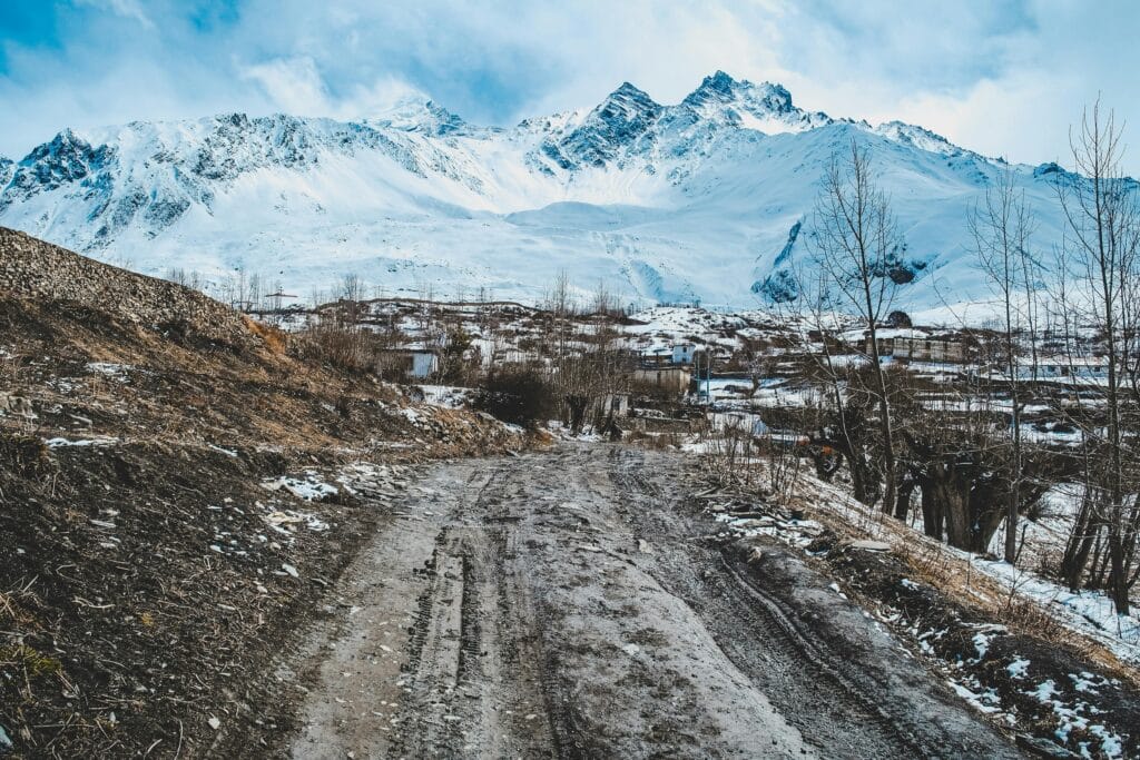 Ground Road to Village in Mountains
